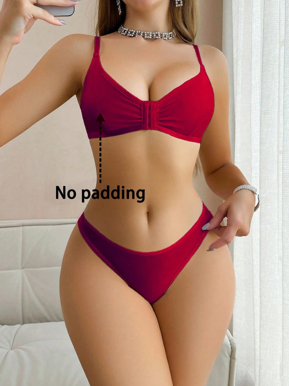 Red bikini with 'No padding' text on a neutral background
